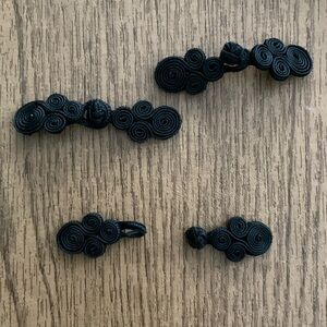 Black Chinese frog buttons